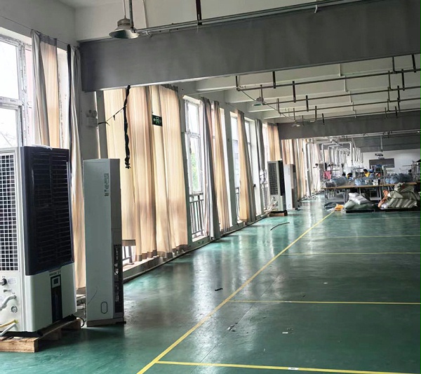 制衣厂整体制冷降温，应用蒸发冷省电空调-立式轴流双风口机型